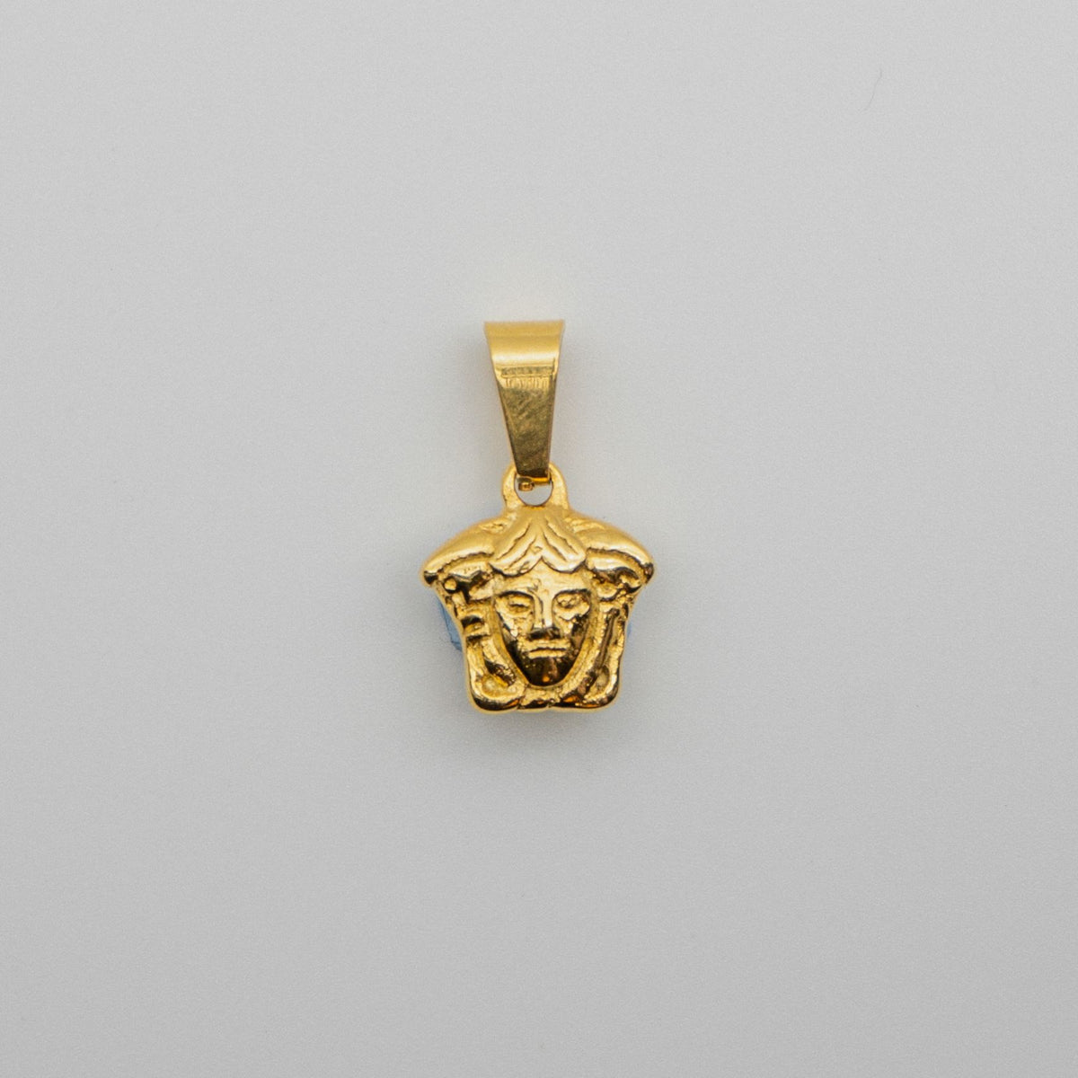 Solid gold medusa on sale pendant